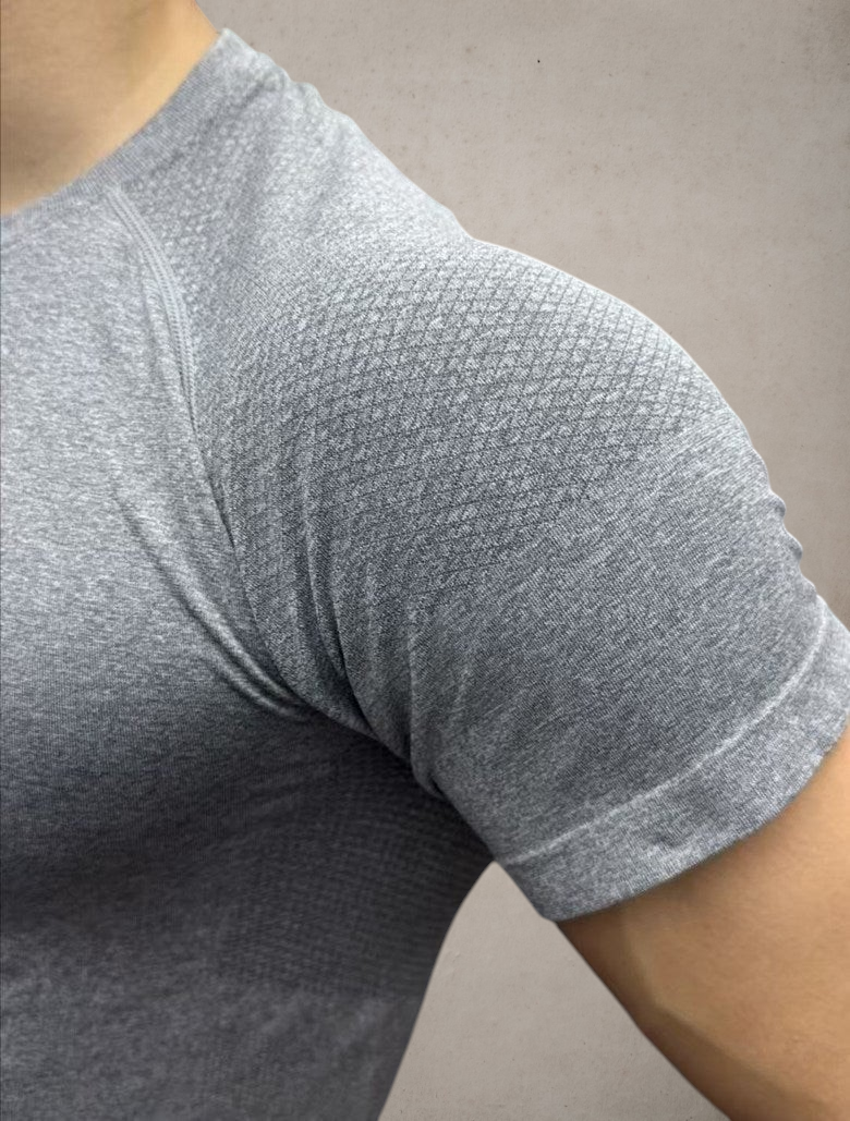 ASCEND gray seamless compression short sleeve tee with textured shoulder detailing for a muscular fit