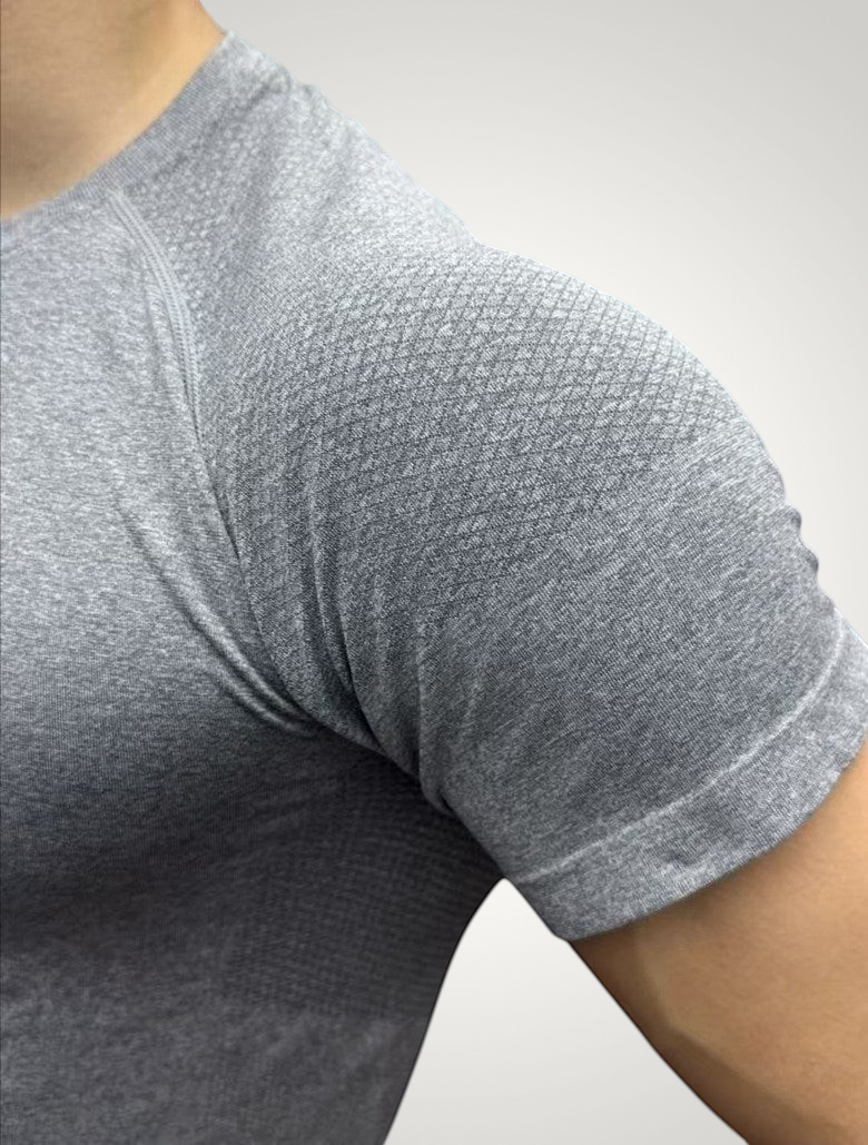 ASCEND gray seamless compression short sleeve tee with textured shoulder detailing for a muscular fit
