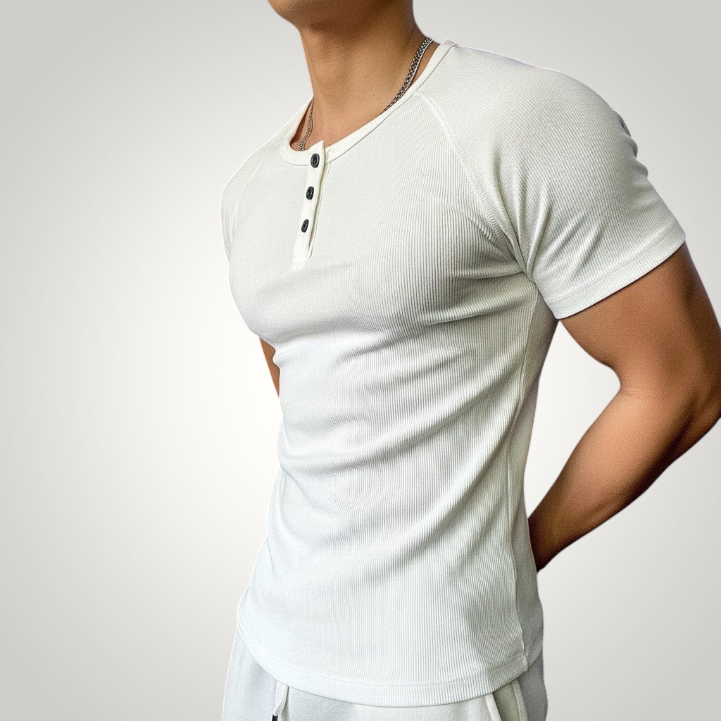 ASCEND white ribbed henley neck compression t-shirt worn by a muscular man in a gym setting
