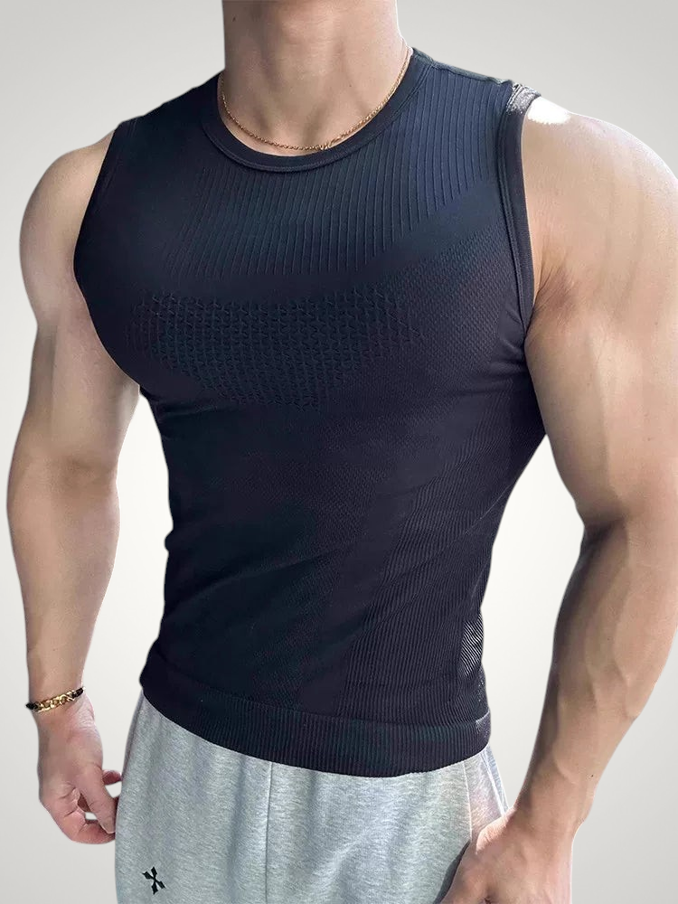 ASCEND black textured compression tank top worn by a muscular man in a gym setting