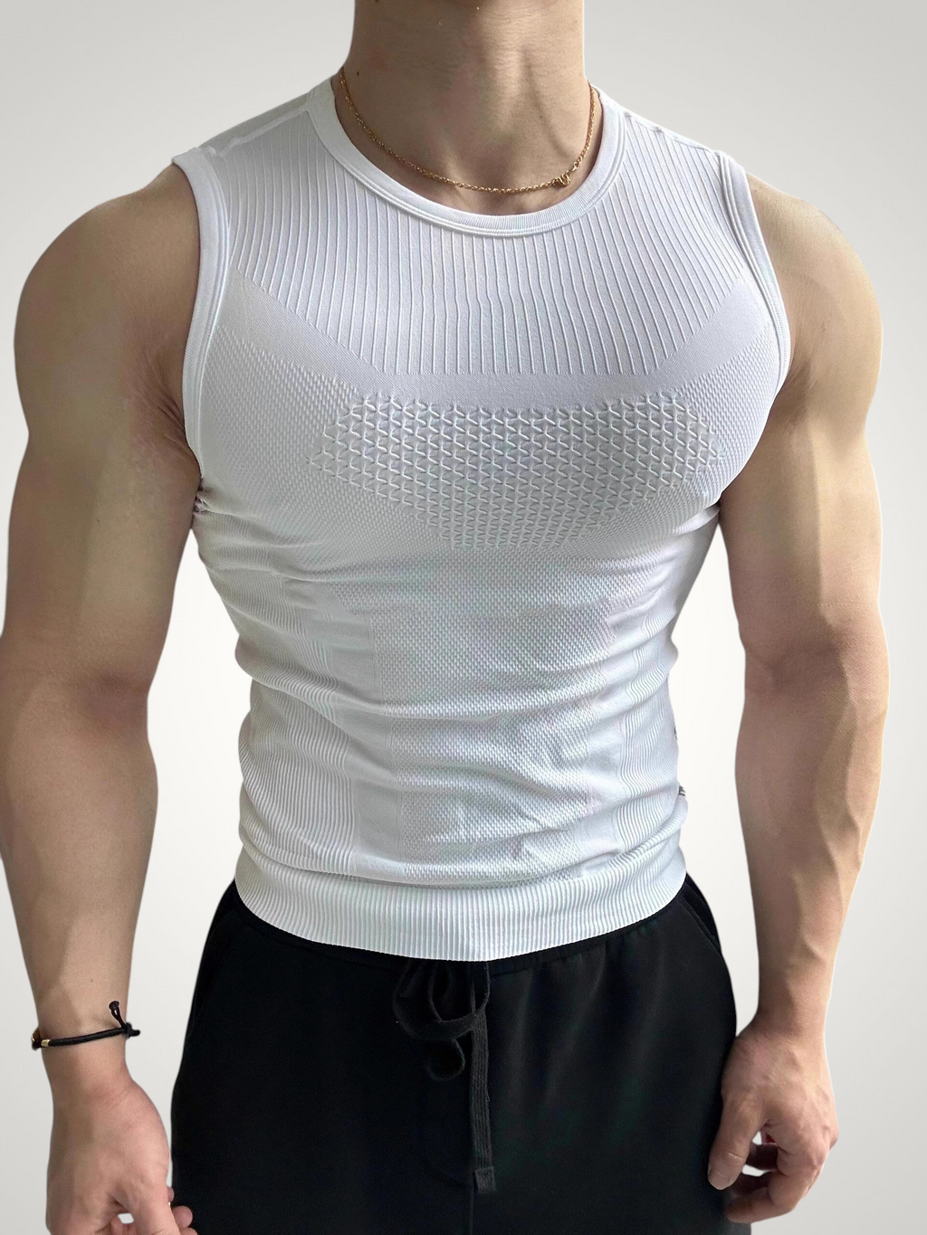 ASCEND white textured compression tank top for men, featuring a slim fit, nylon blend fabric, and ribbed detailing.