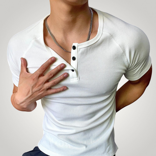ASCEND white ribbed henley neck compression t-shirt worn by a muscular man in a gym setting